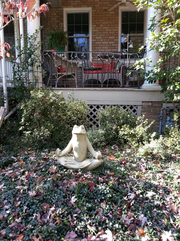 meditating from yard statue